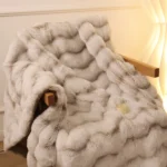 Plush faux fur blanket draped over chair