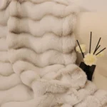 Cream faux fur throw with reed diffuser