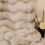 Cream faux fur throw with reed diffuser