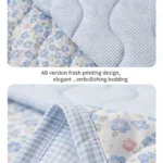 Blue gingham and floral quilted bedding detail